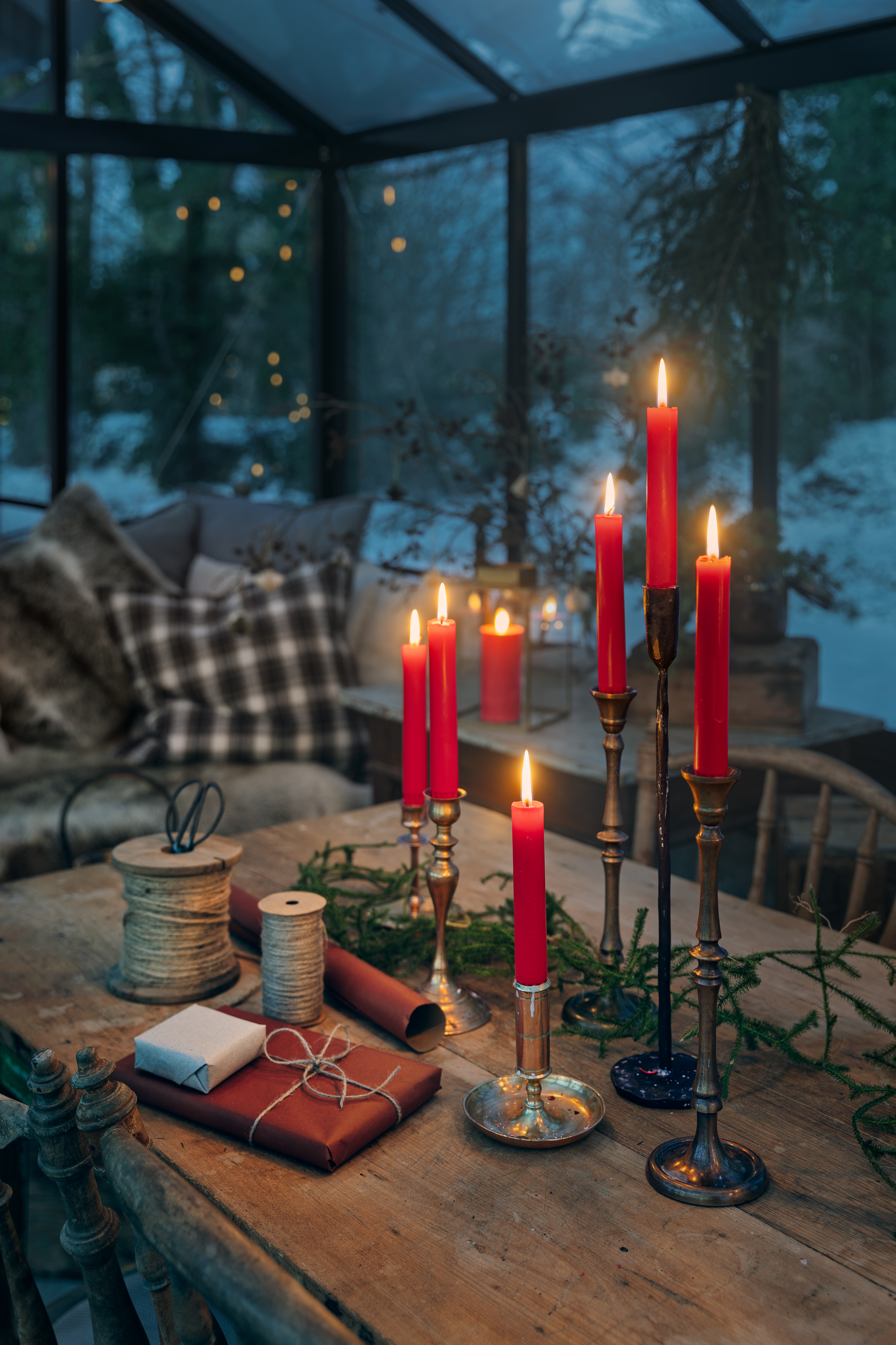 Liljeholmens Stearinfabrik's red Christmas candles create ambiance